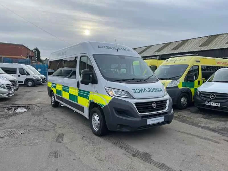 Passenger access and seating area inside an 8 passenger seat patient transport vehicle